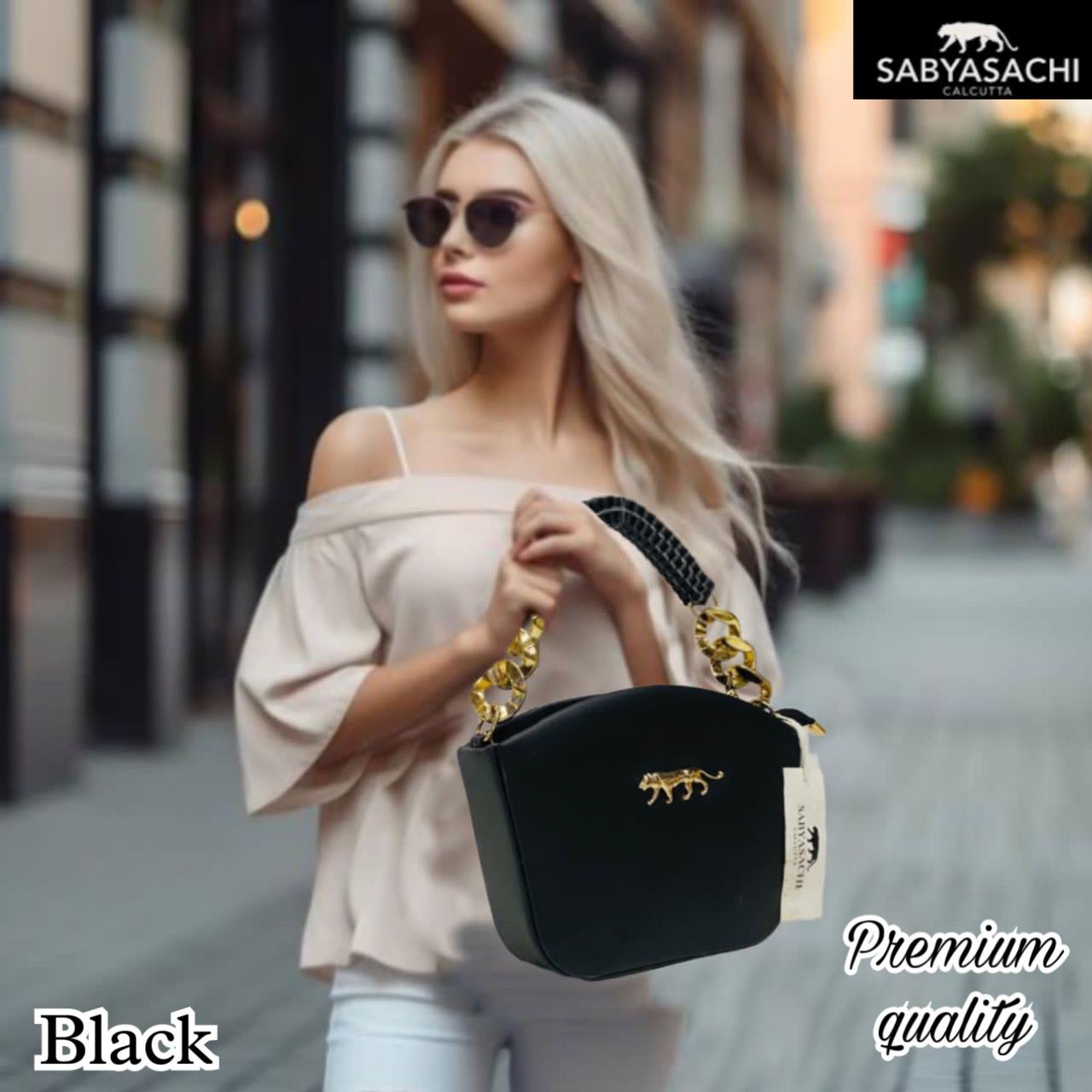 Regal Radiance: Sabyasachi Sling Bag with Weaved Handle